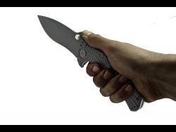 Woman robbed at knifepoint in her home