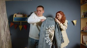 Young Man Tries On Denim Jacket Stock Footage Video (100% Royalty-free) 1085628284 | Shutterstock