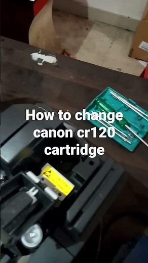 How to change canon cr120 cartridge