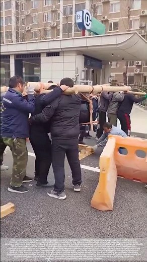 The group carried the explosion-proof sphere indoors for installation.