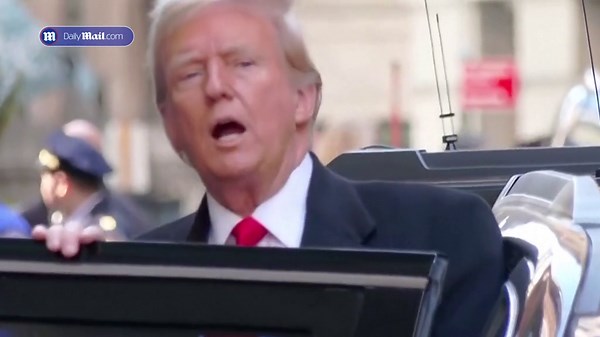 Trump exits 40 Wall St. in Downtown Manhattan, New York