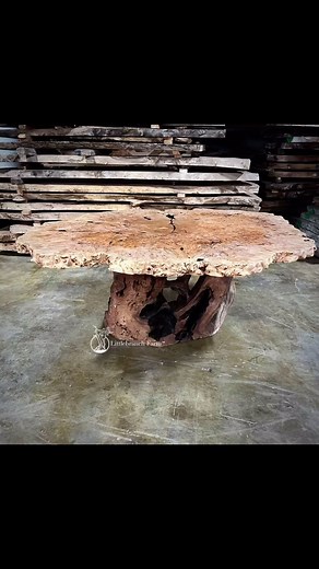 Maple burl dining table on a root base. It measures 82” x 63” oval. #burl #naturalwood #diningtable #functionalfurniture #handmade #liveedge | Littlebranch Farm