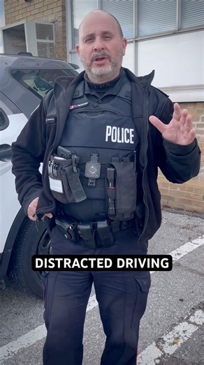Distracted driving ticket while stopped at a red light?