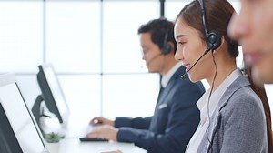 clip-1063059118-asian-call-center-team-customer-service-telesales
