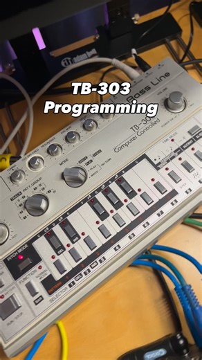 Italo Brutalo on Instagram: "The next step was adding a Roland TB-303 line. Since my 303 isn’t modded or anything, I had to unplug the sync-in cable in order to program it. After finding a few notes that worked well with the MC-202 bassline, I ran the signal through a Mek TD-1 pedal for some distortion. Once that was done, I plugged the sync-in cable back in to lock the tempo to the MPC3000. Thank God the MPC3000 has four individual MIDI output ports, making it easy to control even larger setups