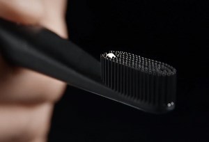 Nest Brush self dispensing silicon bristle UV-C toothbrush