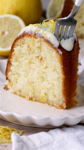 531K views · 4.1K reactions | This Lemon Bundt Cake recipe is absolutely fantastic! The lemon pound cake is so soft and buttery, with a delicious tangy lemon taste. It features a lemon syrup, and a lemon glaze, which makes the cake burst with lemon flavor even more!  Check out this amazing recipe here: https://www.piesandtacos.com/lemon-bundt-cake/ | Pies and Tacos | Facebook