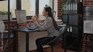 Overworked woman feeling stressed about work deadline, working on computer in startup office. Frustrated entrepreneur with workload and burnout designing business charts under pressure.
