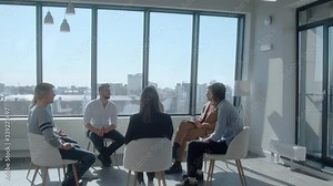 Mixed race employees of a large IT company holds a meeting and outlines the company's development goals. Concept of cost-benefit comparison and financing and credit