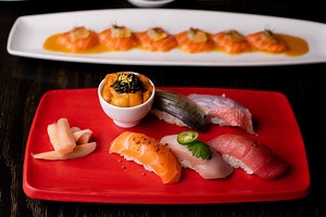 A global master leads a hands-on sushi making class in Vegas