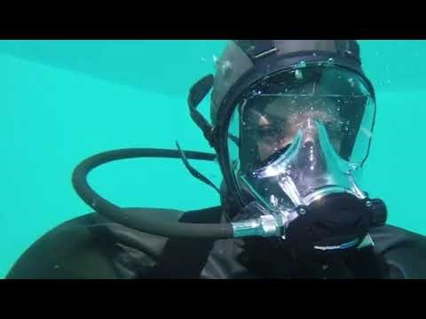 Female Diver is Diving with Rubber Drysuit and Ocean Reef Full Face Mask