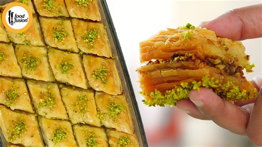 48K views · 467 reactions | Golden, crispy layers of handmade phyllo, filled with a rich nutty mixture and soaked in fragrant syrup. Every bite melts in your mouth, balancing crunch and sweetness to perfection. Baklava bliss, made from scratch! #happycookingtoyou #foodfusion #araywahh #monthofgood Written Recipe: https://bit.ly/4bMFSeg | Food Fusion | Facebook