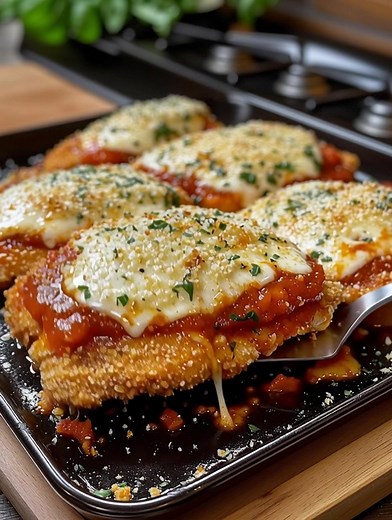 24K views · 80 reactions | Chicken Parmesan  Try it, you will not regret it! Ingredients: 4 chicken breast fillets 1 cup of regular flour 2 beaten eggs 1 cup of breadcrumbs 1/2 cup of grated Parmesan cheese 1 tsp of dried basil leaves ................. Full Recipe in Coʍmеոτ   | Cook By Book | Facebook