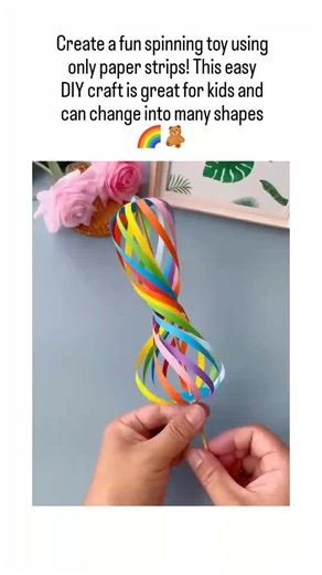 TrendSnap on Instagram: "This post features a 30-second video tutorial on crafting a colorful paper-strip spinner, using basic supplies like strips, a hole punch, glue, and a stick, which twists into dynamic shapes when spun. @WealthMail regularly shares quick DIY life hacks and family-friendly tips, with this video earning over 1,500 likes in its first day, fitting their mission to enhance daily life through simple, engaging activities. Hands-on crafts like this spinner promote children's creat