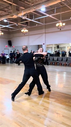 Slow Foxtrot demonstration: Feather Step, Natural Turn, Reverse Wave, Natural Turn.