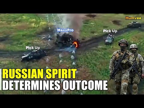 Burning MaxxPro next to smoking Humvee dotted Sumy steppe