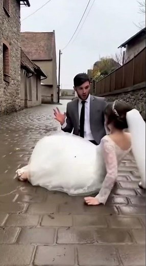 BRIDE FALLS! 😱 Groom Trips Carrying Her Over Threshold