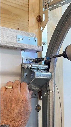 How to Install a Commercial Adjustable Top Roller Bracket | Garage Door Repair DIY