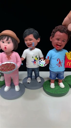 Unstoppable Joy with Handmade Clay Bobbleheads Swaying Together