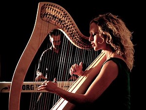 Come and experience the beautiful sounds of FitkinWall, who are performing at HFC on Thursday 2 June. This intimate, rhythmic and exciting show, described as 'Quietly Magical' by The Times, was inspired by Cornish composer Graham Fitkin and harpist Ruth Wall's work with aerial theatre company Ockham's Razor. Performing on harps, moog synthesizers and autoharp, accompanied by vivid visuals from film maker Ryan Sharpe, this rich audio visual feast weaves a magical musical journey, from tentative o