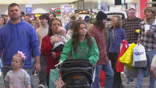Shoppers fill Huntington Mall on Saturday before Christmas