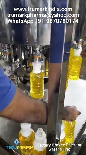 ROTARY GRAVITY FILLER FOR LIQUID FILLING