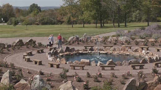 Here's a drone video of the Compass Rose... 40 memorial stones engraved with each of the names of the Heroes of Flight 93 surround the reflecting pool. The benches look like wood, but are actually concrete! And then there's the Julie Andrews roses... That's Clay Mankamyer talking with some visitors (and yes, dogs on a leash are welcome)! | Remember Me Rose Garden - A Living Tribute to the Heroes of 9/11 Flight 93
