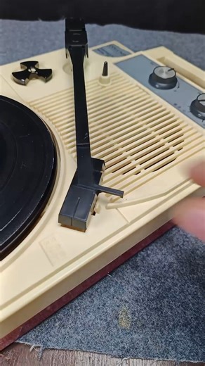 Columbia GP-3 turntable, a vintage piece with a rich history. This model was produced in the late 1970s, featuring a plastic build and reliable performance. It includes an idler-drive motor, adjustable pitch control, and a built-in speaker and amplifier, making it suitable for both casual listening and vinyl enthusiasts. Serial No. 1561047 #turntable #columbiaGP3 #electronics | Mr. Mend