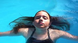 Young Girl Swimming Pool Stock Footage Video (100% Royalty-free) 1036429139 | Shutterstock