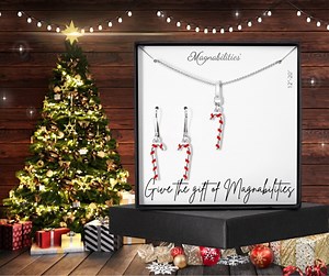 🎄✨Introducing our enchanting NEW Christmas Jewelry Sets! 🎁❄️ Get ready to spread some holiday cheer with our adorable snowman ⛄, sweet Gingy the Gingerbread Man 🍪, festive Christmas tree 🎄, and delightful candy cane 🍭 jewelry sets! These pieces are the perfect way to add a touch of holiday magic to your festive outfits. 🎅✨ https://magnabilities.com/shop/339/gift-sets #ChristmasJewelry #HolidayStyle #FestiveFashion #GiveawayAlert 🎁🤩 | Magnabilities