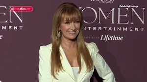 Jane Seymour, 72, flashes her legs in a thigh-split red satin gown