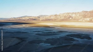 The majestic beauty of Badwater Basin is captured by a drone camera in an aerial shot.