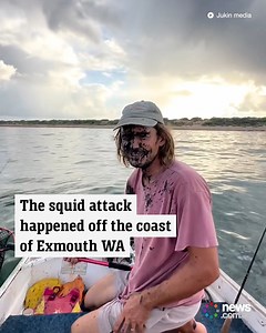 This Aussie fisherman copped a face full of ink from an angry squid in defensive mode! | News.com.au