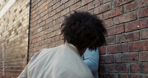 City, angry and men in street fight with conflict, battle and disagreement with danger, punching and drama. Argument, bullying and friends in urban brawl at brick wall alley with frustrated violence