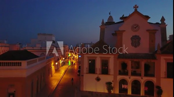 Olhao with historic cathedral in the center by night, Algarve, Portugal