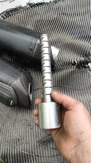 DB killer: a device that reduces motorcycle exhaust noise.