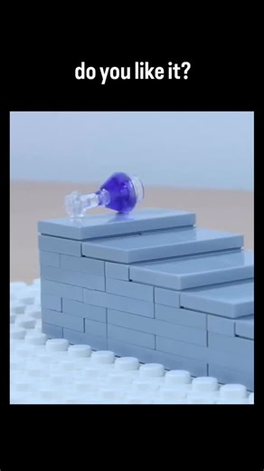 zonofun on Instagram: "This LEGO stop-motion video animates colorful liquid drops cascading down gray brick stairs, using translucent pieces for a satisfying, ASMR-like pour effect over 16 seconds. Posted by @ponyswaan on February 5, 2026, it quickly went viral with 7,000+ likes and 466,000 views, drawing praise for its precise craftsmanship and whimsical visuals. Indonesian replies dominate, calling it "seru" (fun), suggesting strong appeal in Southeast Asia amid a trend of DIY LEGO art on X."