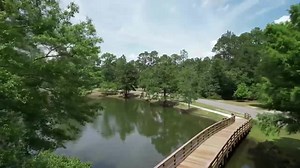 Planning to Visit Statesboro this summer? Spend some time at Edgewood Park! It's located at S. Edgewood Drive and is just steps from Gentilly Road. Stroll around the pond on a walking trail and bridge that completes the loop. This 103-foot-long wooden bridge was completed last spring by Black Creek Construction Inc. and provides a great photo op! It's also a fantastic spot to feed the fish and geese from while you're there! Picnic tables and swings provide the perfect picnic spots for a family o