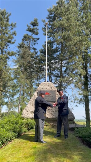 The Red Ensign — the flag that the Newfoundland Unknown Soldier fought under — follows him home today. It was lowered and folded by Frank Sullivan and Berkeley Lawrence of the Royal Canadian Legion Newfoundland Command. | Seamus O'Regan