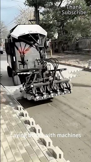 Laying bricks with machines is labor saving and efficient