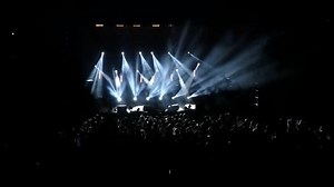 Concert Crowd Under Stage Lights at Night