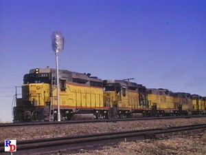 Some of the Union Pacific's wonderful world of 1st and 2nd generation diesel power is seen in Wyoming. Who knows what those structures are on the cab roofs of the SD45's near the end of this video? From the WB Video show "Kindig's Diesels" https://rfd.video/Kindig | Railfan Depot