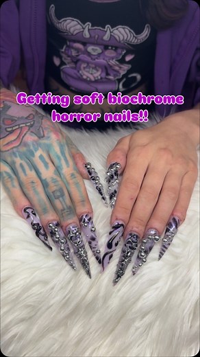 Minitruckmommy 🔧🦇 on Instagram: "Getting Soft biochrome horror nails by @thabratsnails415 ! What do yall think? Would you try these nails?! 💅🏼 ⛓️‍💥🛢️🫟💿 . . . . #nailtech #chrome #womenownedbusiness #stilettonails #goth #pastelgoth #alien #nails #justagirl #girlythings #SelfCare #beauty #cargirl #feminine #feminineenergy #softgirl #explore #cyber #reels #reelsinstagram #nails #longnails #purple #kawaii #cyberpunk #horrornails #pastel #grunge #latina #bayarea"