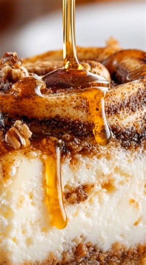 Cinnamon Roll Honeybun Cheesecake 🍯🍥 Ultra-rich, swirled with cinnamon sugar, and dripping with honey-bun glaze—this dessert is pure indulgence and perfect for holidays or special occasions. Crust 2 cups vanilla wafer crumbs (or graham crackers) ½ cup melted butter 2 Tbsp brown sugar 1 tsp cinnamon Cinnamon Swirl ½ cup brown sugar 2 tsp cinnamon 2 Tbsp melted butter 1 Tbsp flour Cheesecake Filling 4 (8 oz) packages cream cheese, softened 1 cup granulated sugar ½ cup sour cream ¼ cup heavy crea