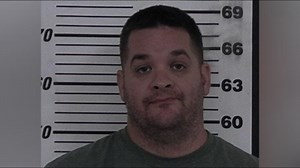 Former Macon police officer who fatally shot 'Junebug' charged with stalking