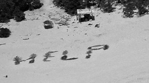 'HELP' sign on beach points rescuers to men stuck nine days on remote Pacific island