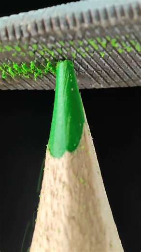 Green Colored Pencil Worn Down By Arrow In Satisfying Friction Experiment