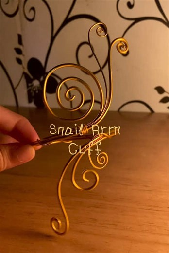 Whimsical Arm Cuff Inspired by Memoir of a Snail