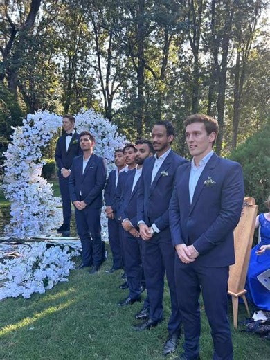 Bold and Bright Groomsmen Outfits: Navy Blue Suits for a Perfect Wedding