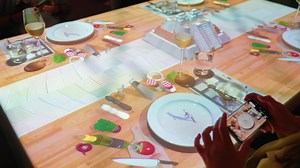 榮獲台北國際食品展👨‍👩‍👧‍👦 Le Petit Chef 是世界上第一個，也是獨一無二的使用3D動畫用餐體驗的餐廳！在你的餐桌上，主廚本人和他的烹飪夥伴，如魔法般地招待及帶領著 – 當你和他一同踏入香料之旅時，並且不斷地擴大範圍– 接著體驗幕後的廚房歷險記，讓你掉入到在主菜和甜點的垂涎服務中。所有的一切都歸功於世界最偉大的廚師、世界上最著名的餐廳 – 以及世界知名的比利時高科技動畫工作室Skullmapping。為什麼在餐桌上安排了視覺饗宴呢 - 當你在享用美食的過程中，這就是一場表演！Le Petit Chef 的用餐體驗現今已在全世界超過25個最佳旅遊地點推出！立即搶先預訂這千載難逢的美食冒險旅程 | Le Petit Chef